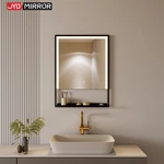 Miroir de salle de bain avec étagère