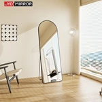 Miroir sur pied arqué